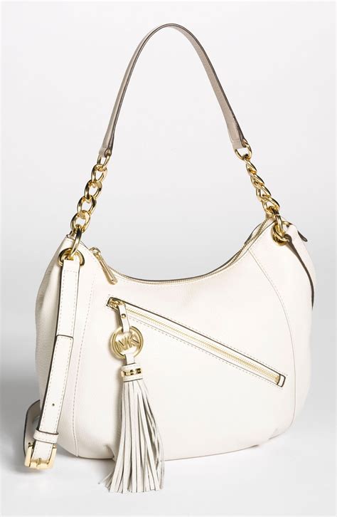 michael michael kors charms bag|Michael Kors charm tassel.